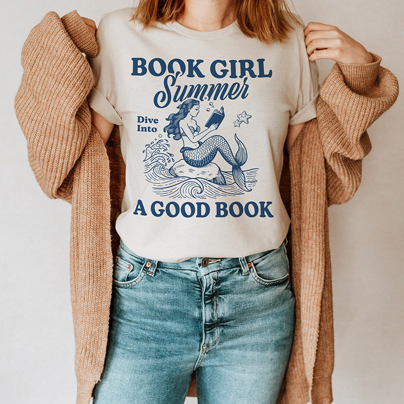 Model styled casually in reading-themed graphic tee — relaxed fit summer shirt for book lovers