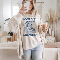 Model lounging in Book Girl Summer tee — soft bookish t-shirt for women
